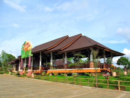a building with a pavilion in a park at Sabaidee Valley in Ban Gnik