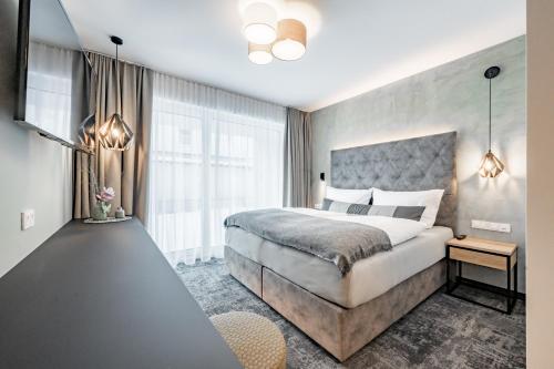 Posteľ alebo postele v izbe v ubytovaní jordan´s Lodge126