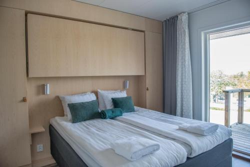 Postel nebo postele na pokoji v ubytování Hotell Kneippbyn Resort Visby