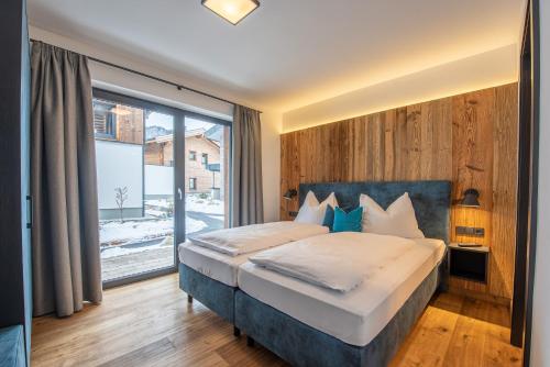 Posteľ alebo postele v izbe v ubytovaní Chalet's DAS DORF