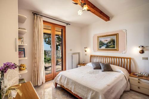 Posteľ alebo postele v izbe v ubytovaní Il Pioppo - Country House Sea View