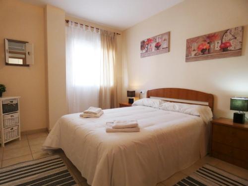 Posteľ alebo postele v izbe v ubytovaní Anacasa Vora Golf II Playa Rabdells AP437