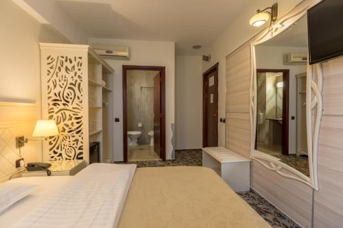 Ένα ή περισσότερα κρεβάτια σε δωμάτιο στο Casa Siqua