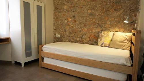 Posteľ alebo postele v izbe v ubytovaní VACAY Apartamento Gracia, Ubicación Inmejorable A Pocos Pasos de la Playa y Tiendas en la Costa Brava, l'Escala
