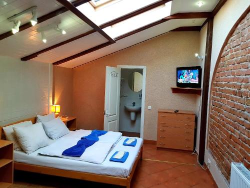 TV a/nebo společenská místnost v ubytování Sun Hotel
