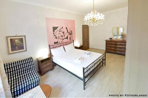 Ein Bett oder Betten in einem Zimmer der Unterkunft IzzHome La Signorina