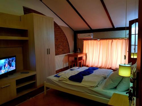 Postel nebo postele na pokoji v ubytování Sun Hotel