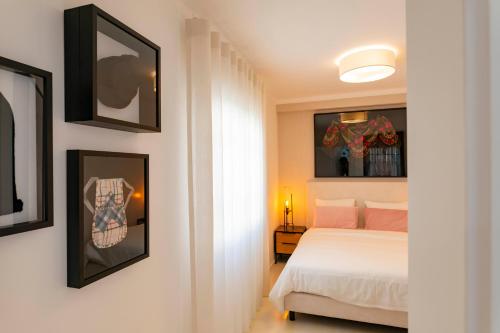 En eller flere senger på et rom på DonaCamó Charming House