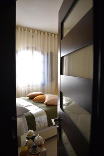 Poschodová posteľ alebo postele v izbe v ubytovaní Ta Gangu
