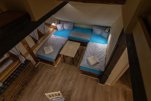 an overhead view of a bedroom with two beds at Stará škola in Dolní Malá Úpa