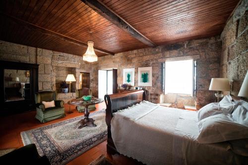 Ένα ή περισσότερα κρεβάτια σε δωμάτιο στο Casa do Ribeiro