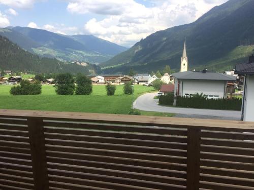 a view of a small village with a church at Ferienwohnung Trocker in Krimml