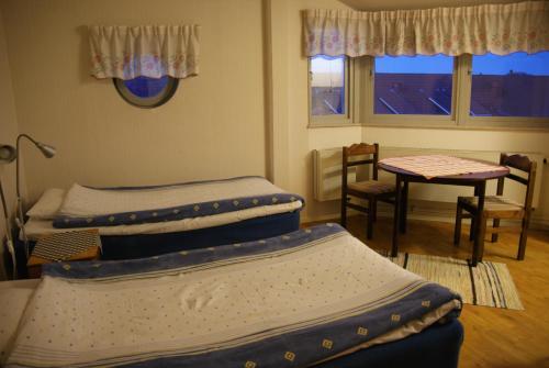 Postel nebo postele na pokoji v ubytování Wellingehus Hotel