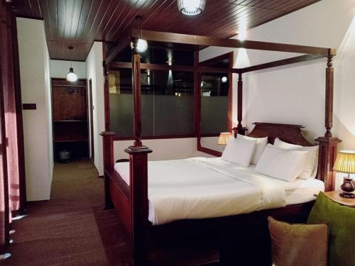 Ένα ή περισσότερα κρεβάτια σε δωμάτιο στο Cozy Homestay