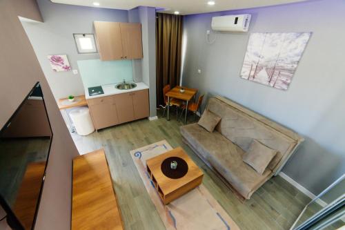 Χώρος καθιστικού στο Etna Apartments