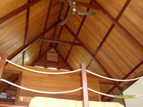 a wooden ceiling with ropes in a room at Yellow Houses Bocas DUPLEX in Bocas del Toro