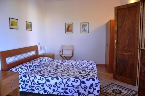Katil atau katil-katil dalam bilik di Lubagnu Vacanzemare