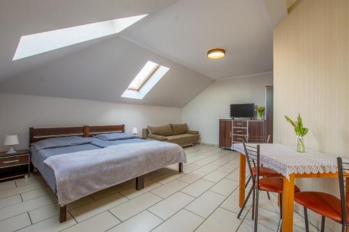 Łóżko lub łóżka w pokoju w obiekcie Villa Sol