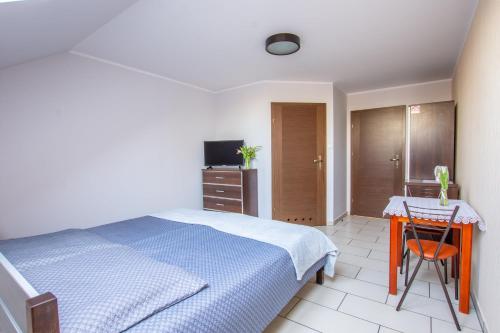 Łóżko lub łóżka w pokoju w obiekcie Villa Sol
