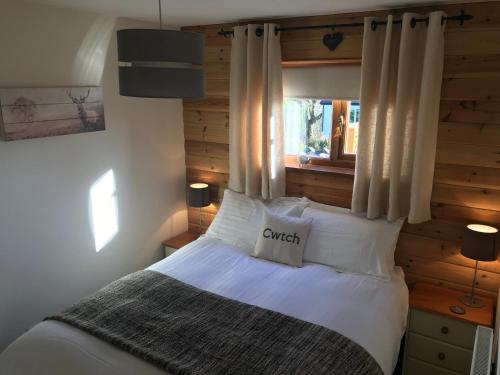 Katil atau katil-katil dalam bilik di Swansea Log Cabin