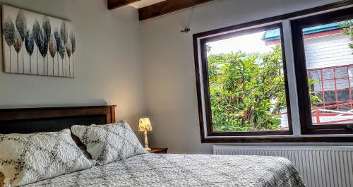Postel nebo postele na pokoji v ubytování Hotel y Cabañas Molino Viejo