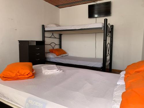 Postel nebo postele na pokoji v ubytování Casa hotel Sports and Family