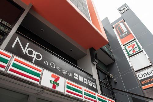a building with a nope in china sign on it at Nap in Chiangmai in Chiang Mai