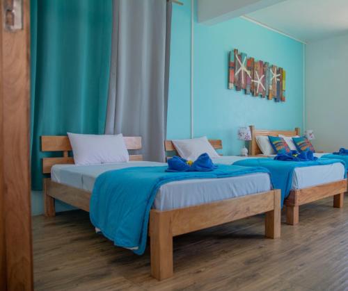 Postel nebo postele na pokoji v ubytování Villa Paradise Rodrigues
