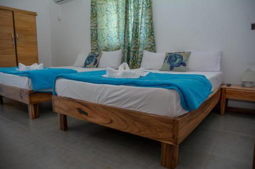 Ένα ή περισσότερα κρεβάτια σε δωμάτιο στο Villa Paradise Rodrigues