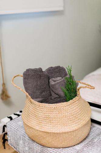 a basket filled with towels on top of a table at Ma Maison Ioannina in Ioannina