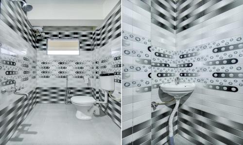 a bathroom with a toilet and a sink at Treebo Sayaji Residency in Pune