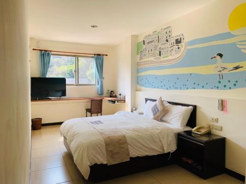 Una cama o camas en una habitación de Be Yun Tien Resort