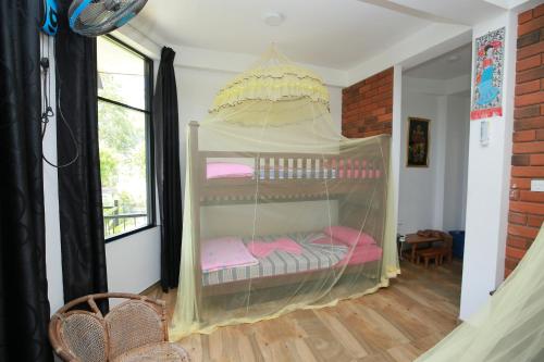 Postel nebo postele na pokoji v ubytování Rock side inn - Ella