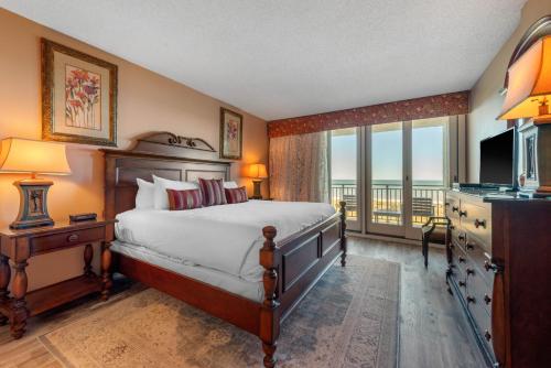 Ένα ή περισσότερα κρεβάτια σε δωμάτιο στο Villas Of Amelia Island