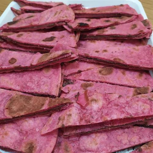 a pile of pink meat on a white plate at Residence Margherita in Cattolica