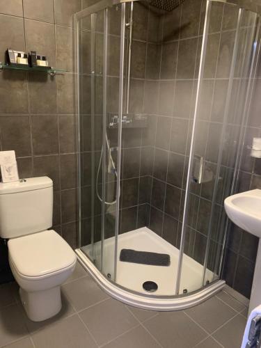 Ein Badezimmer in der Unterkunft Grimscote Manor Hotel