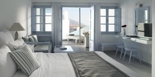 Ένα ή περισσότερα κρεβάτια σε δωμάτιο στο Maison Des Lys - Luxury Suites