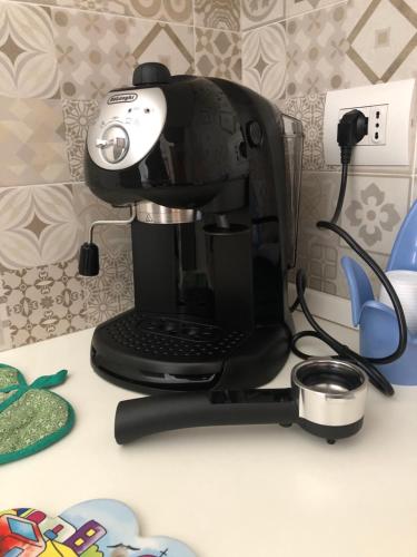 a coffee maker sitting on top of a counter at Al Civico 3 CENTRO in Polignano a Mare