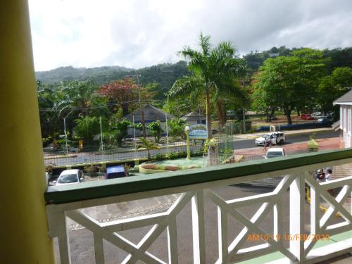 a view of a city from a balcony at SandCastles Holiday #C9 in Ocho Rios