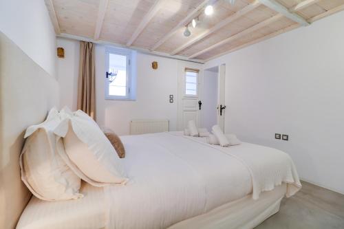 Posteľ alebo postele v izbe v ubytovaní Athens Residence Apartments