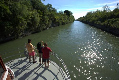 a group of people on a boat on a river at Holiday Inn Niagara Falls State Park Entry by IHG in Niagara Falls