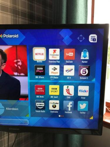 a television screen with a bunch of icons on it at towerhill in Culloden