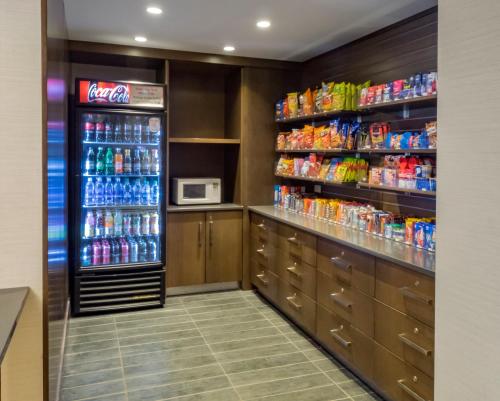 a soda shop with a vending machine and a refrigerator at Holiday Inn Niagara Falls State Park Entry by IHG in Niagara Falls