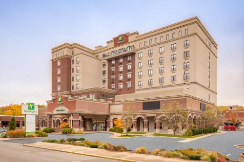 a rendering of the front of a hotel at Holiday Inn Lafayette-City Centre by IHG in Lafayette