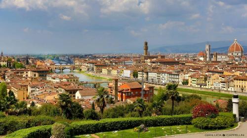 a view of a city with a river and buildings at Dimora Pieri in Florence
