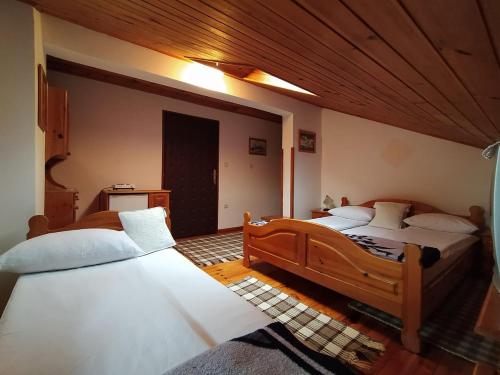 מיטה או מיטות בחדר ב-Apartmani Milić