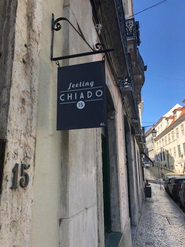 a sign for a tasting chapel on the side of a building at Feeling Chiado 15 in Lisbon