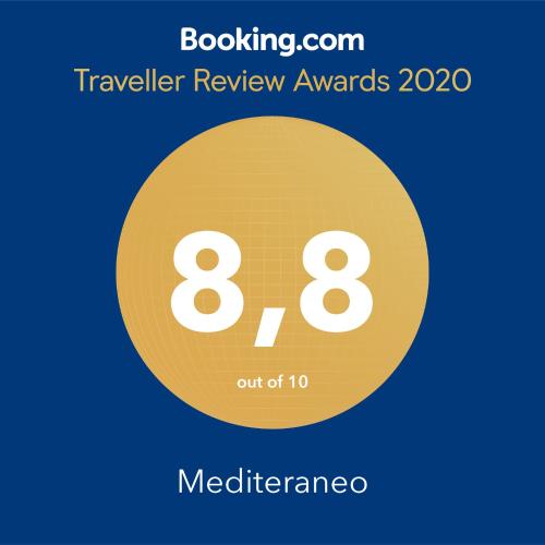 a yellow circle with the number eight and the text travelling review awards at Mediterraneo in Hülben