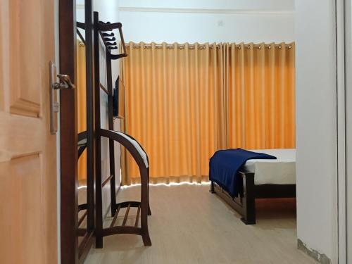 a small room with a bed and a window at Greenfield Bedz in Hatton