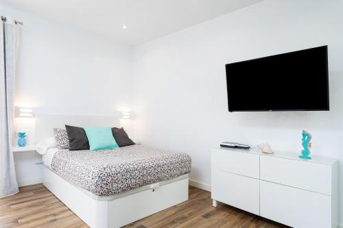 Llit o llits en una habitació de Apartamento Playa Paraíso